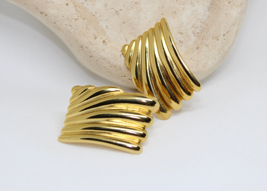 18k gold-filled sculptural drop earrings with twisted ripple design, bold statement studs.