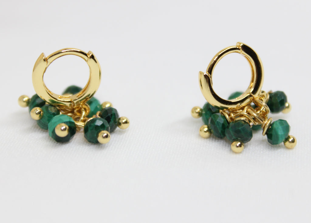 Gold hoop earrings with faceted green malachite beads, non-tarnish hoops for growth and protection.
