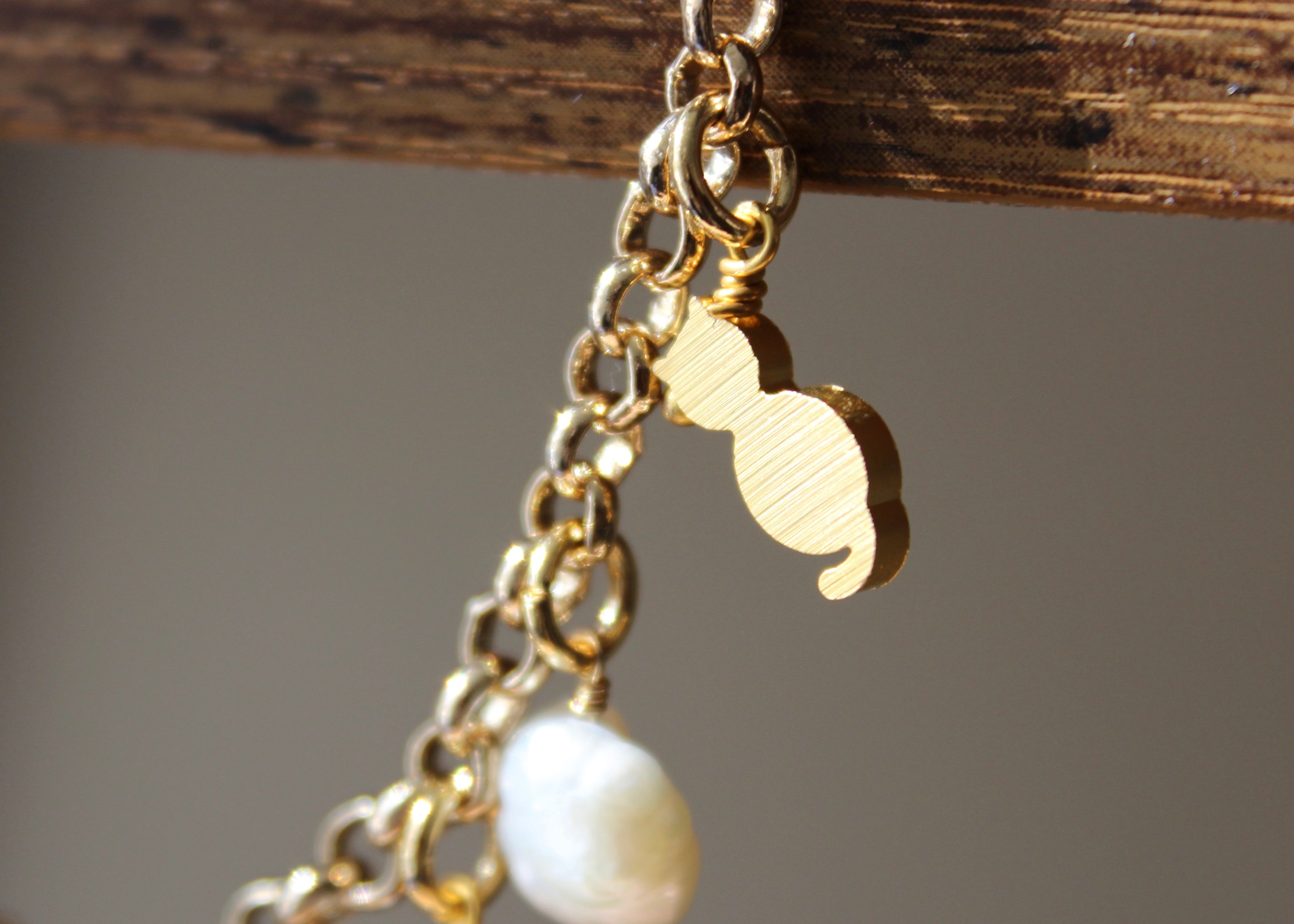 gold-filled chain necklace, pearls, amethyst, "you" charm, gold cat charm, planet charm, BTS K-pop