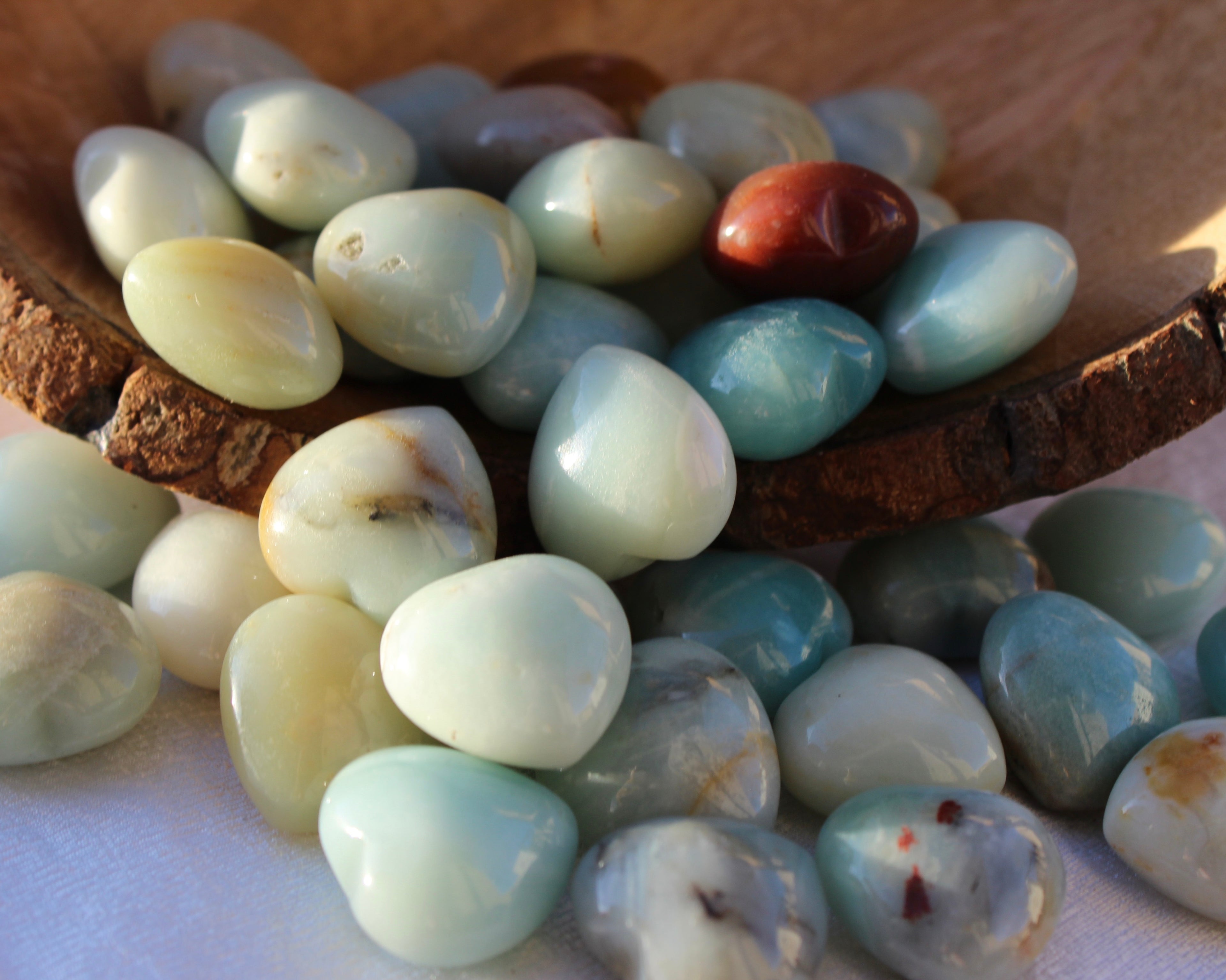 crystal hearts, flower amazonite, ammonite, tumbled hearts