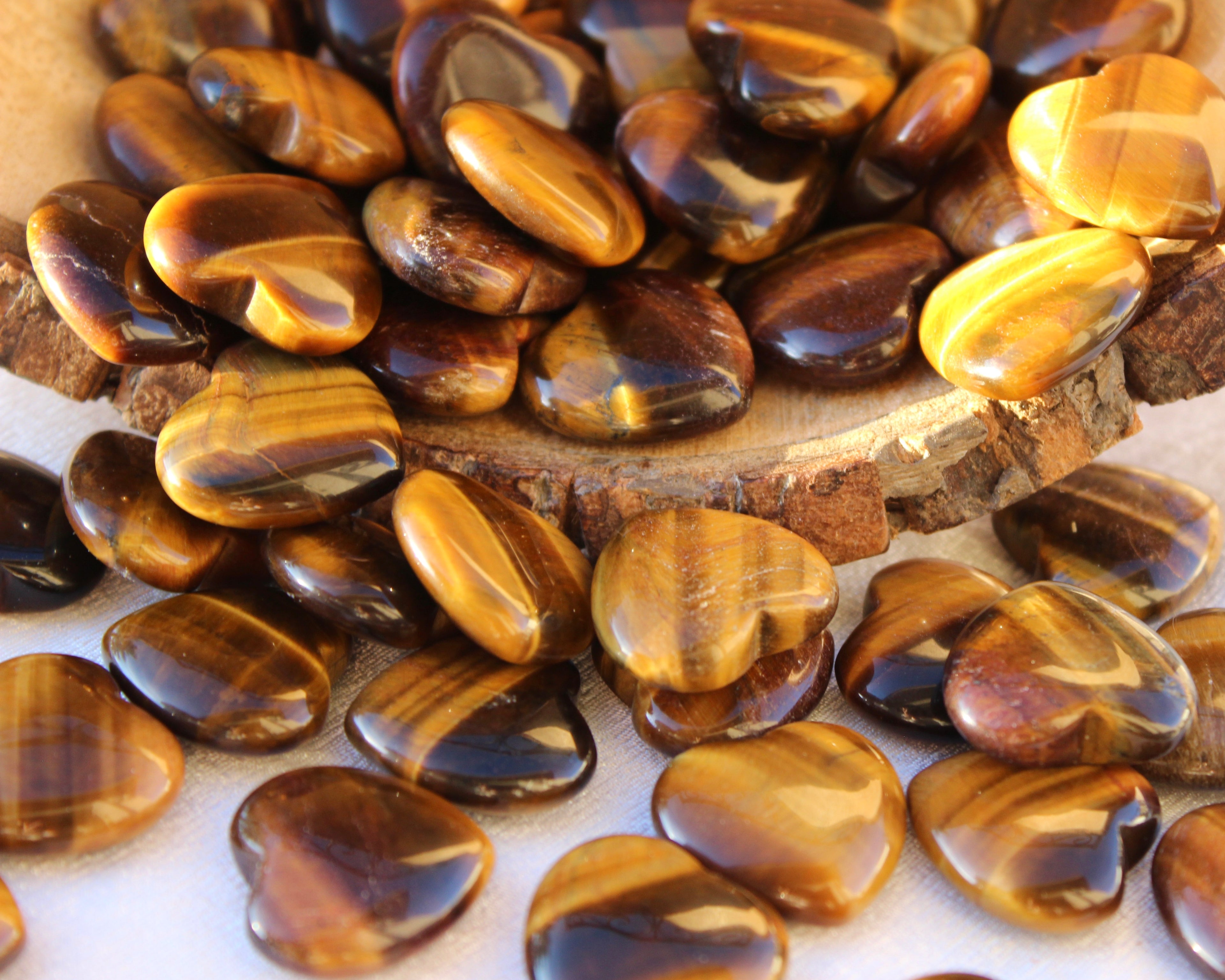 gold tigers eye, crystal hearts, tumbled stone